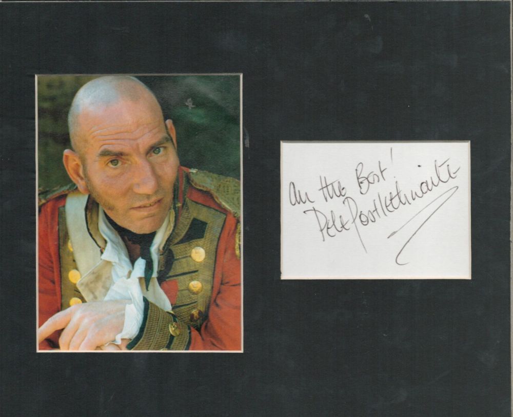Lot 145: Pete Postlethwaite signature piece mounted alongside colour photo....