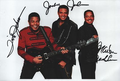 Tito Marlon and jackie jackson signed 12x;8 inch colour photo