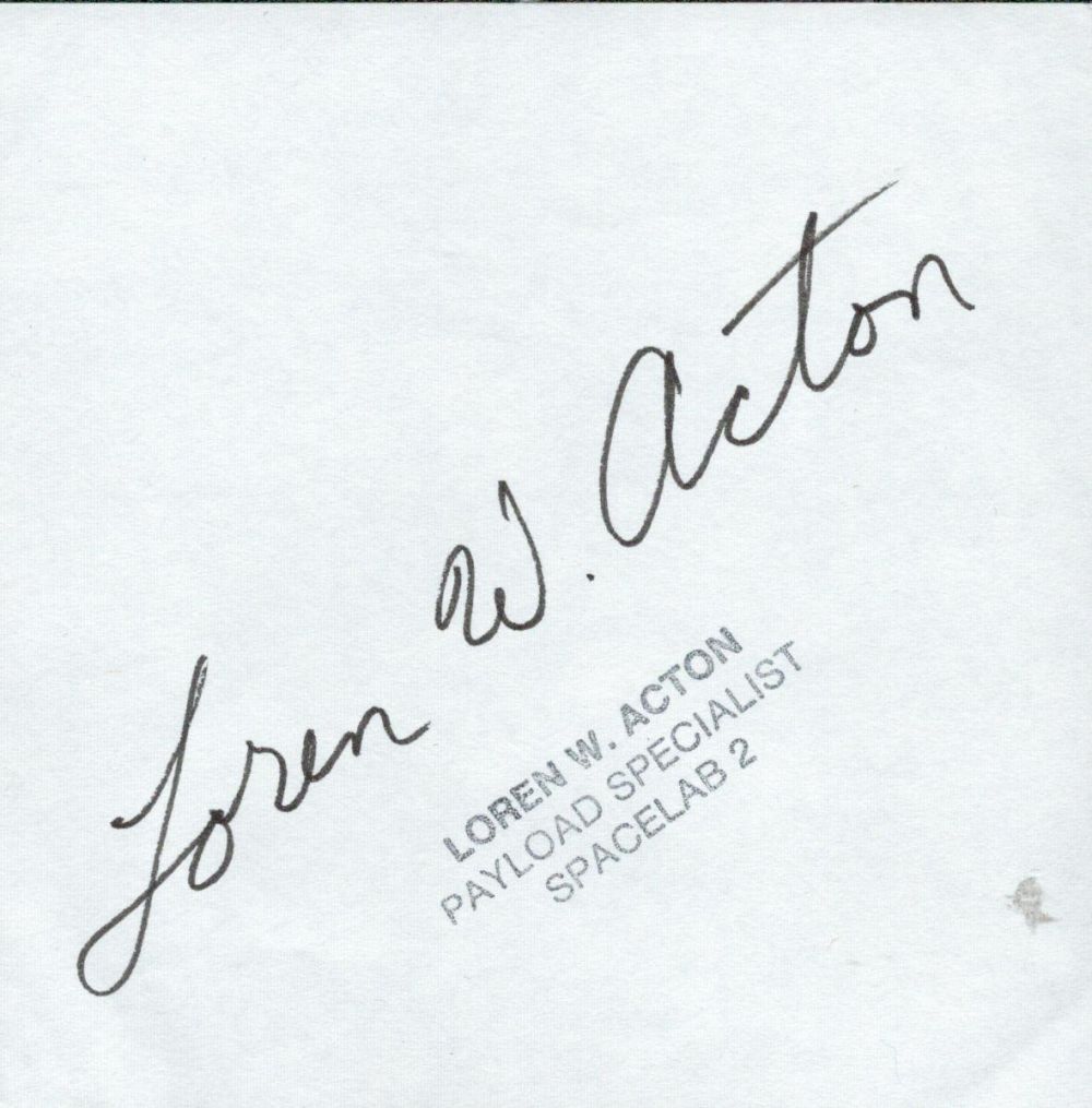 Lot 615: Loren Acton Space Shuttle astronaut signed white paper....