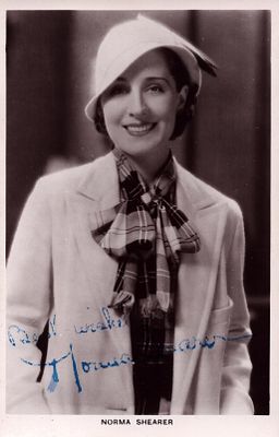 Norma Shearer saying 6X4 inch black and white photo.
