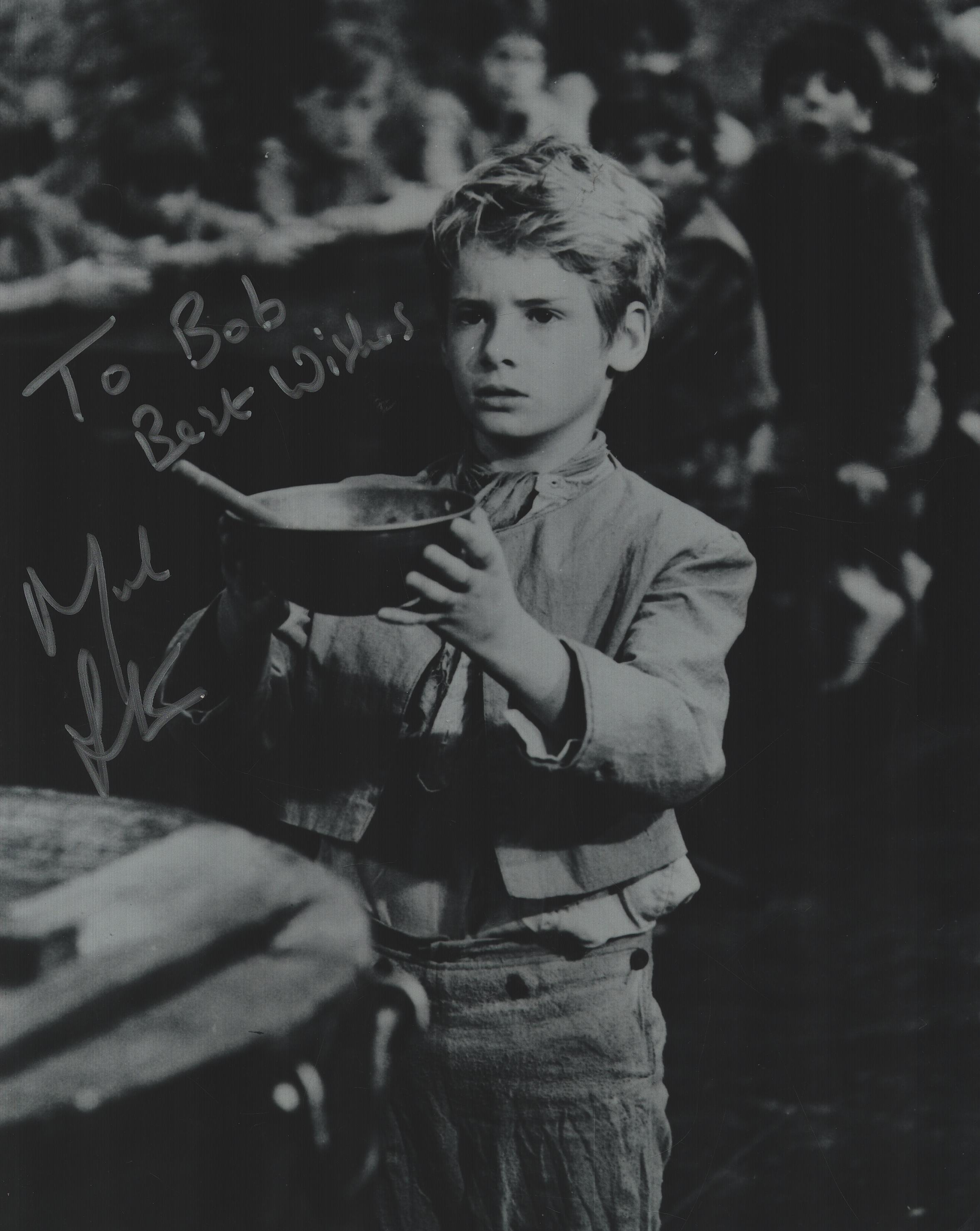 Mark Lester signed 10X8 black and white photo from oliver Dedicated