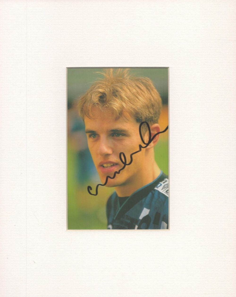 Lot 122: Football, Phil Neville signed colour photograph mounted in...