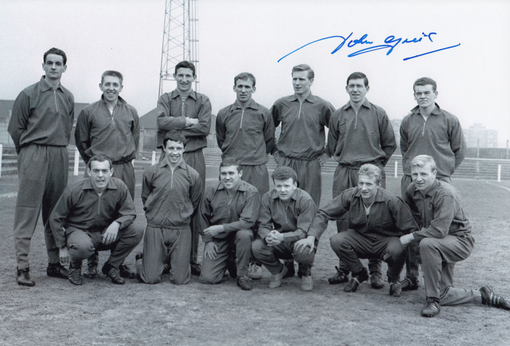 Lot 261: Autographed JOHN GREIG 12 x 8 photo -...