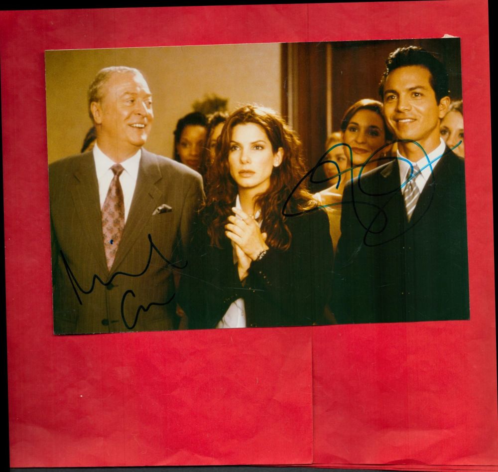 Lot 266: Michael Caine and Sandra Bullock signed 10x8 colour...