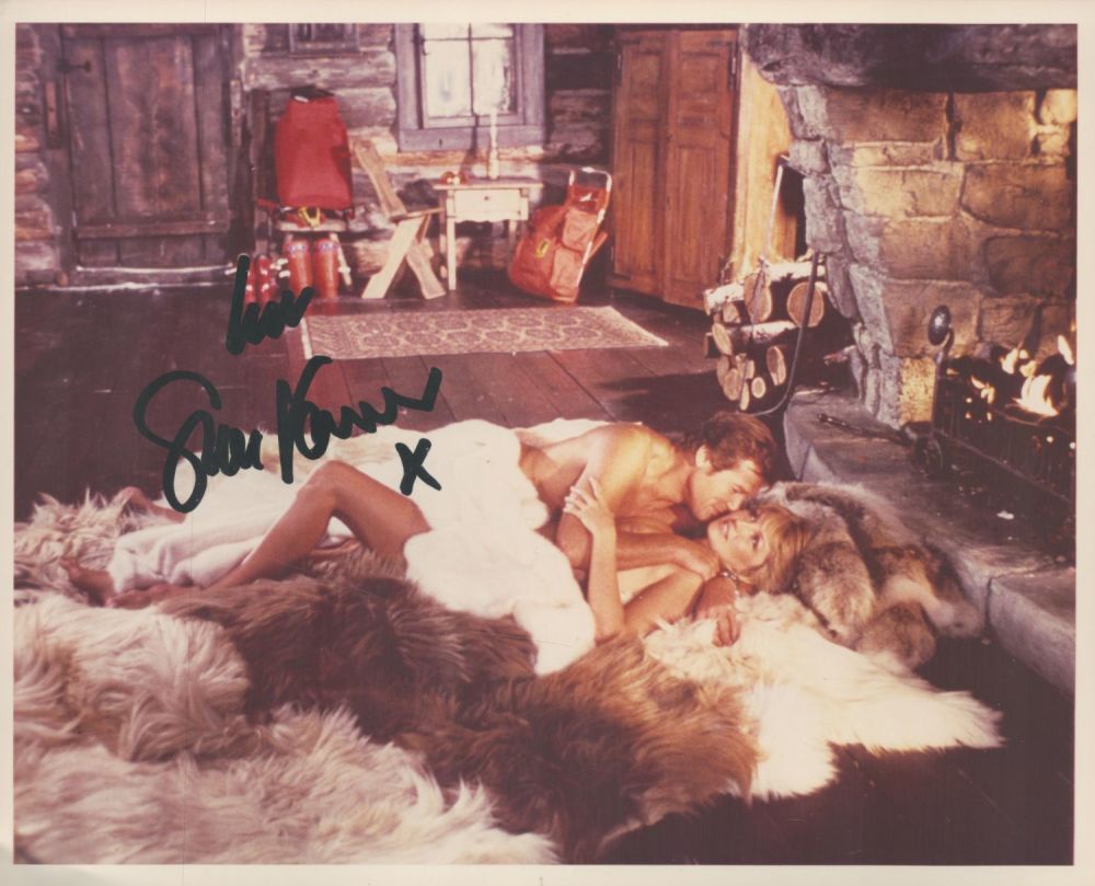 Lot 343: Sue Vanner signed 10x8 James Bond The Spy...