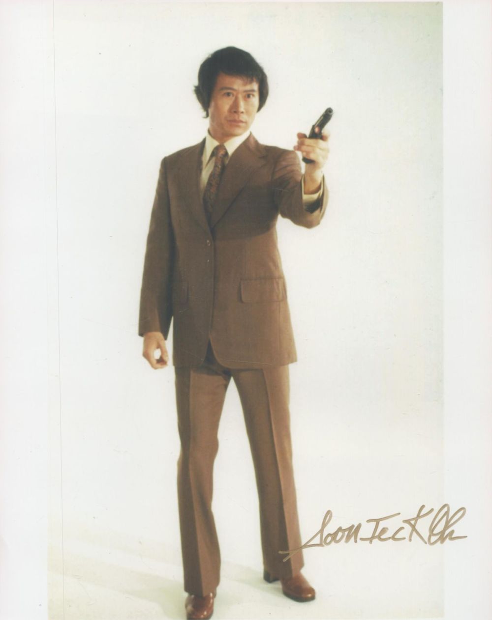 Lot 345: Soohn Taik Oh signed 10x8 James Bond The...