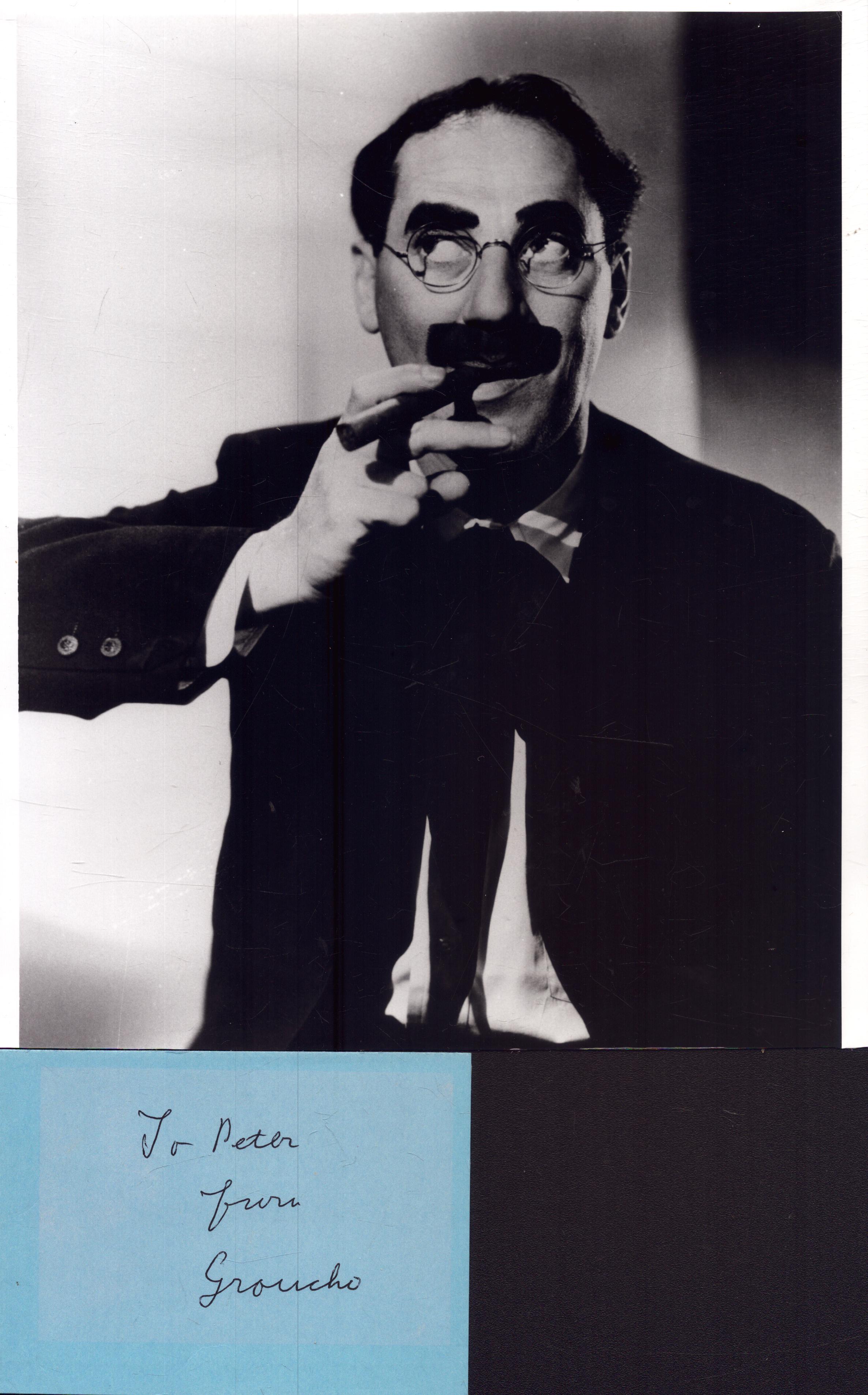 Grouch Marx signed album along with 10X8 Black and white photo