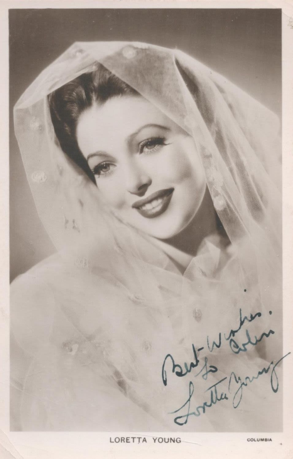 Lot 499: Loretta Young signed 6x4 black and white vintage...
