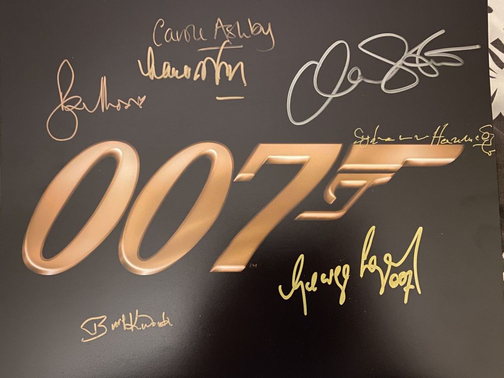 Lot 892: 007 James Bond 14x11 inch logo photo, signed...