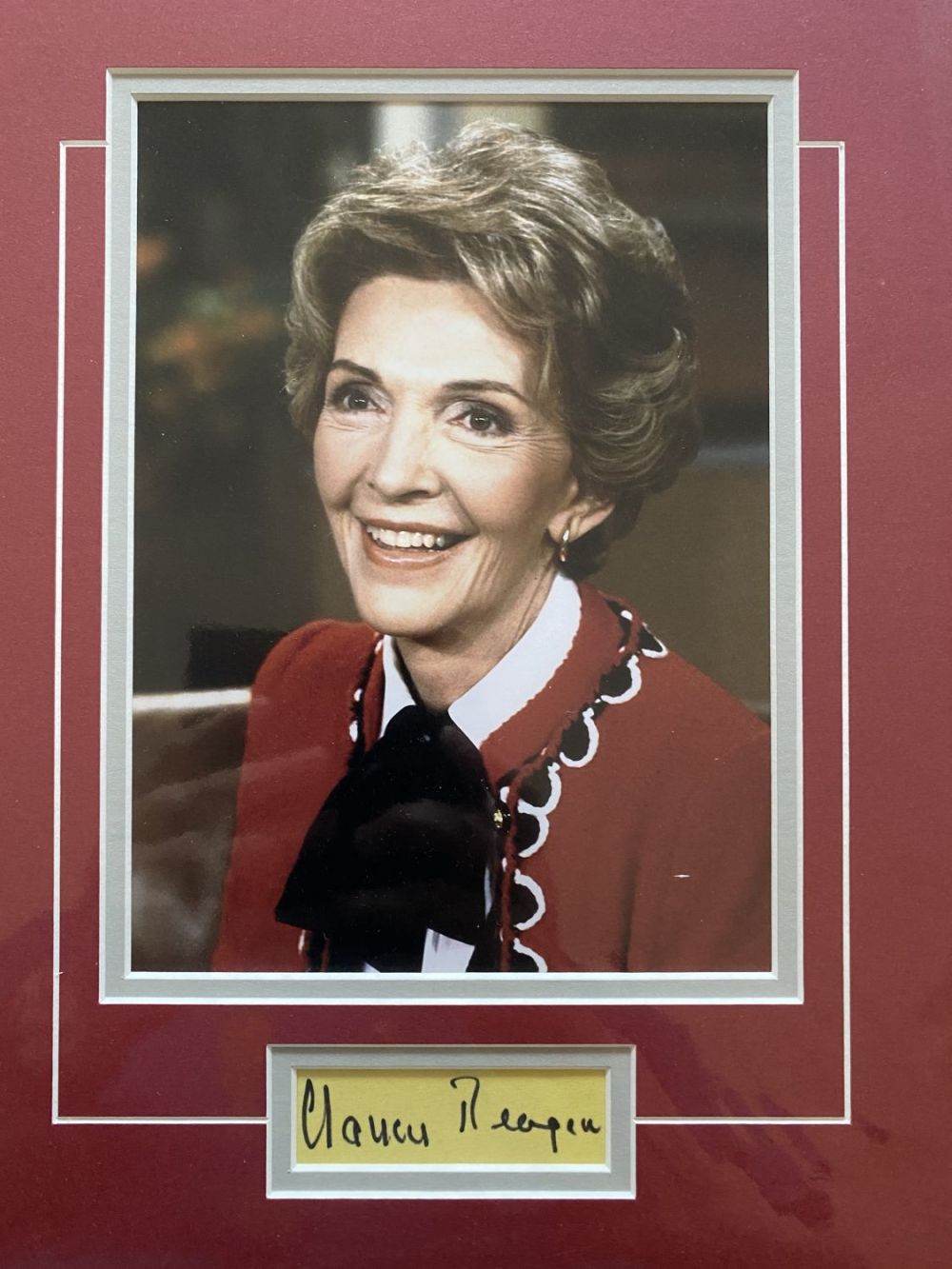 Lot 912: Nancy Reagan signed autograph album page incorporated into...