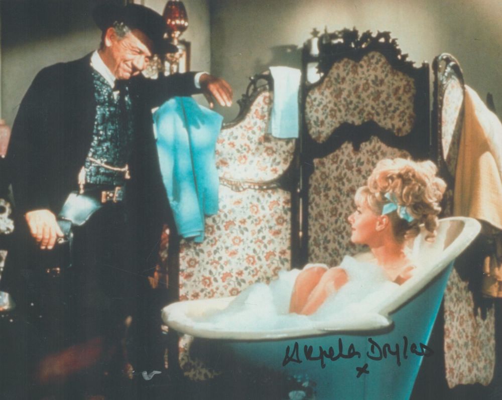 Lot 193: Angela Douglas signed 10X8 Carry On Cowboy colour...