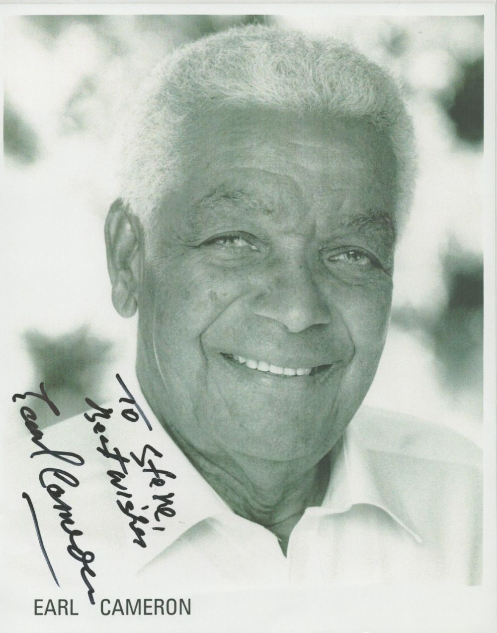 Lot 92: Earl Cameron signed 10x8 black and white photo....