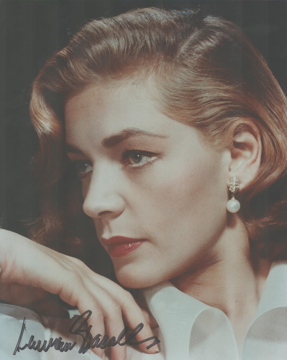 Lot 134: Lauren Bacall signed 10x8 colour photo. Bacall (born...