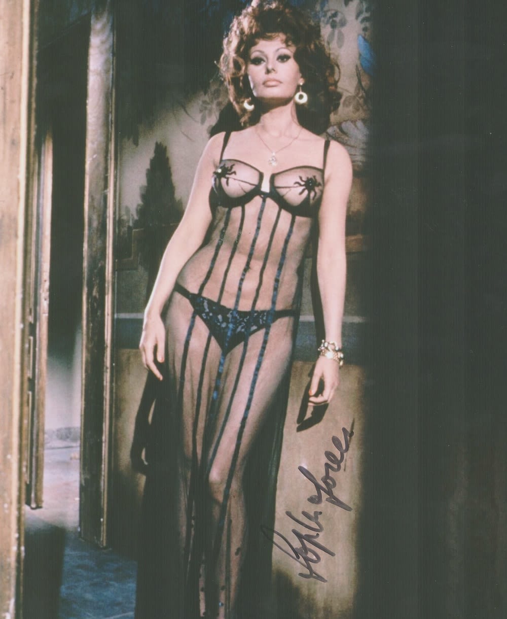 Lot 140: Sophia Loren signed 10x8 colour photo. Loren is...