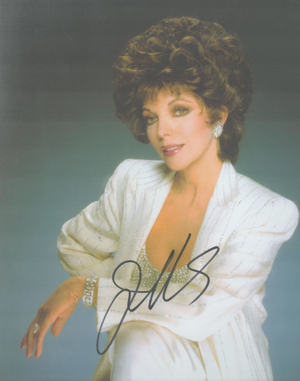 Lot 205: Joan Collins signed 10x8 colour photo. Collins DBE...