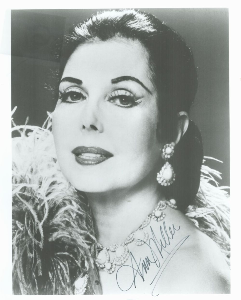 Lot 67: Ann Miller signed 10x8 black and white photo....