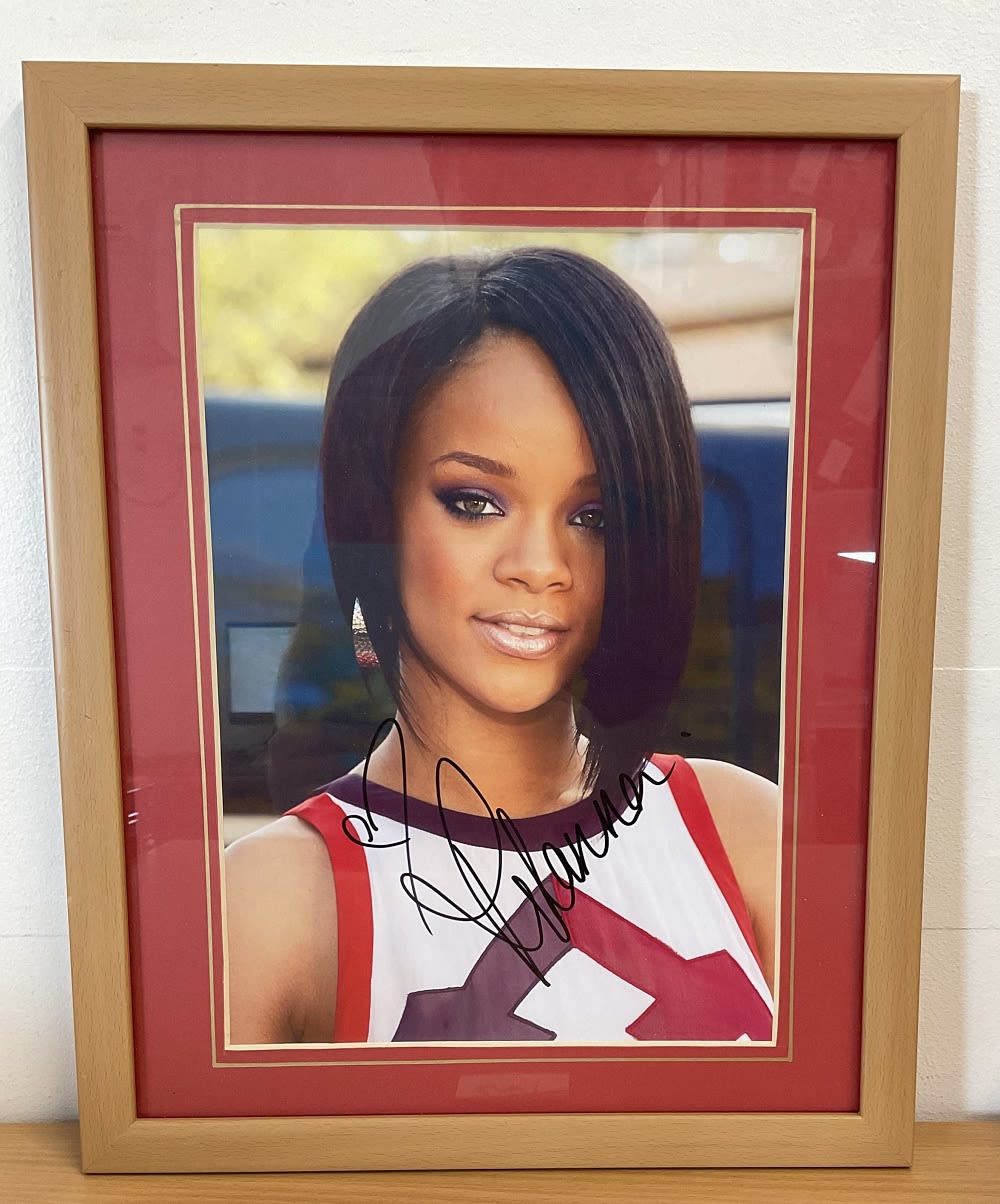 Lot 247: Rihanna signed 16x12 overall mounted and framed colour...