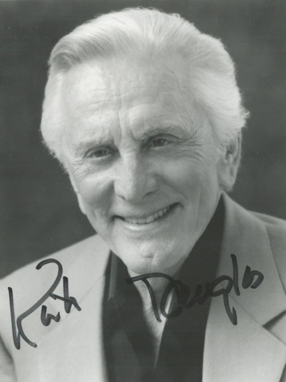Lot 504: Actor Kirk Douglas Signed 4. 5 x 3....