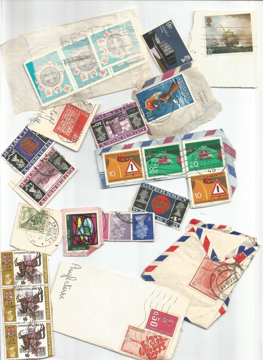 Lot 474: Assorted world stamp collection. Mixed on and off...