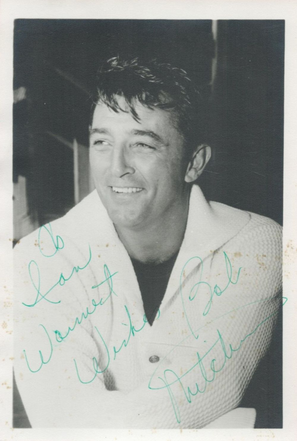 Lot 236: Robert Mitchum signed 7x5 vintage black and white...