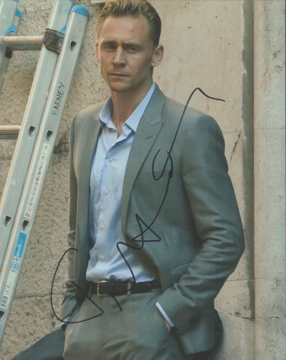 Lot 449: Actor, Tom Hiddleston signed 10x8 colour photograph. Hiddleston...