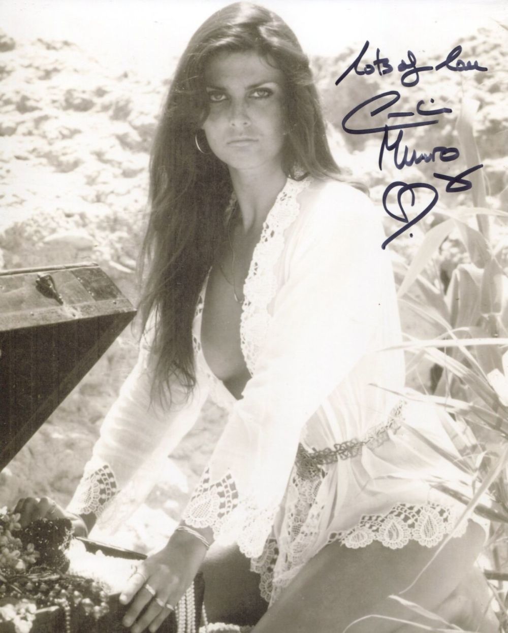 Lot 675: Caroline Munro signed sexy pose photo. Good condition....