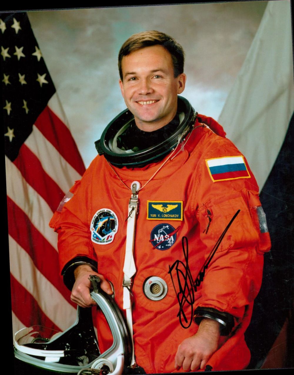 Lot 139: Yuri Lonchakov signed 10x8 colour spacesuit photo. Good...