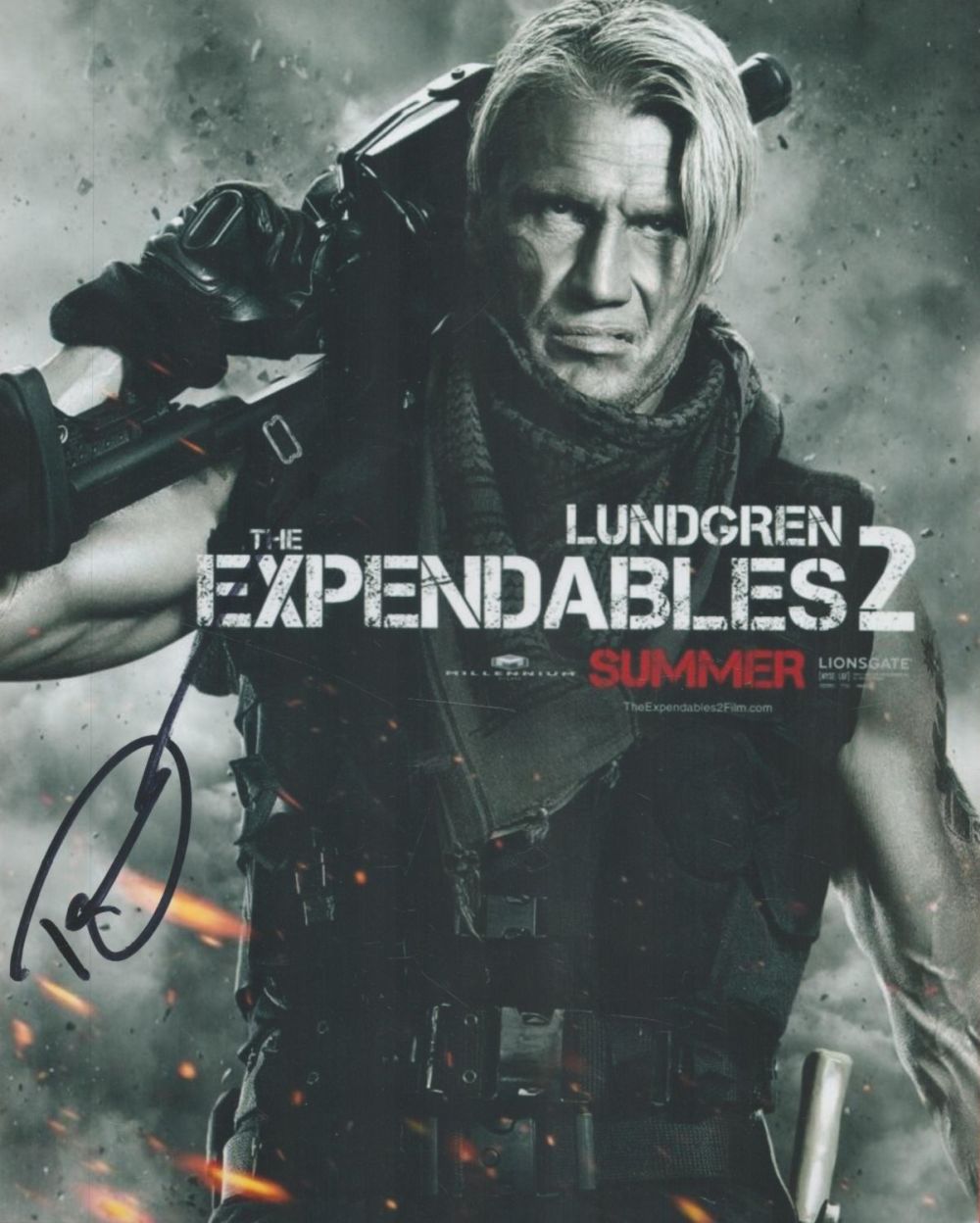 Lot 494: Dolph Lundgren signed Expendables 2 colour promo photo....