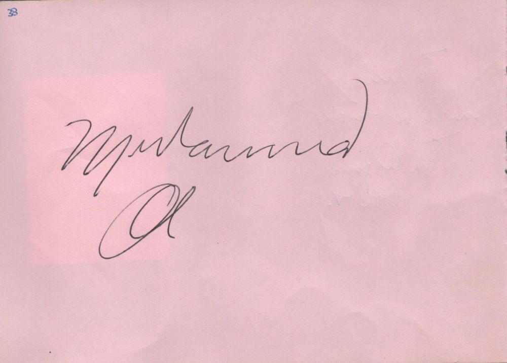 Lot 703: Muhammad Ali signed 5x4 album page. Good condition....