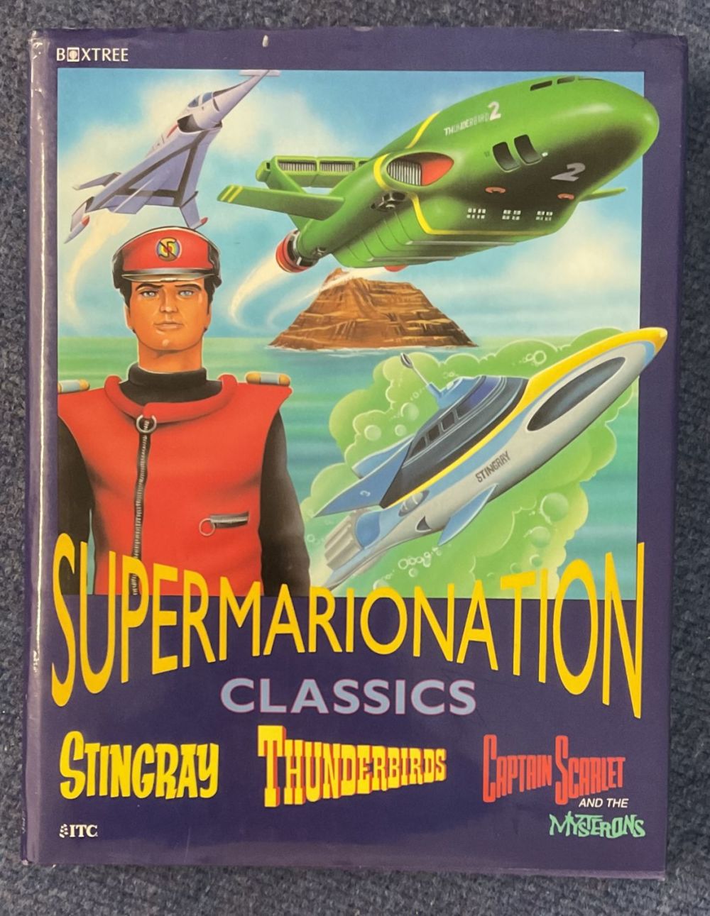 Lot 77: Supermarionation Classics Book. Starring Stingray, Thunderbirds, Captain Scarlet...