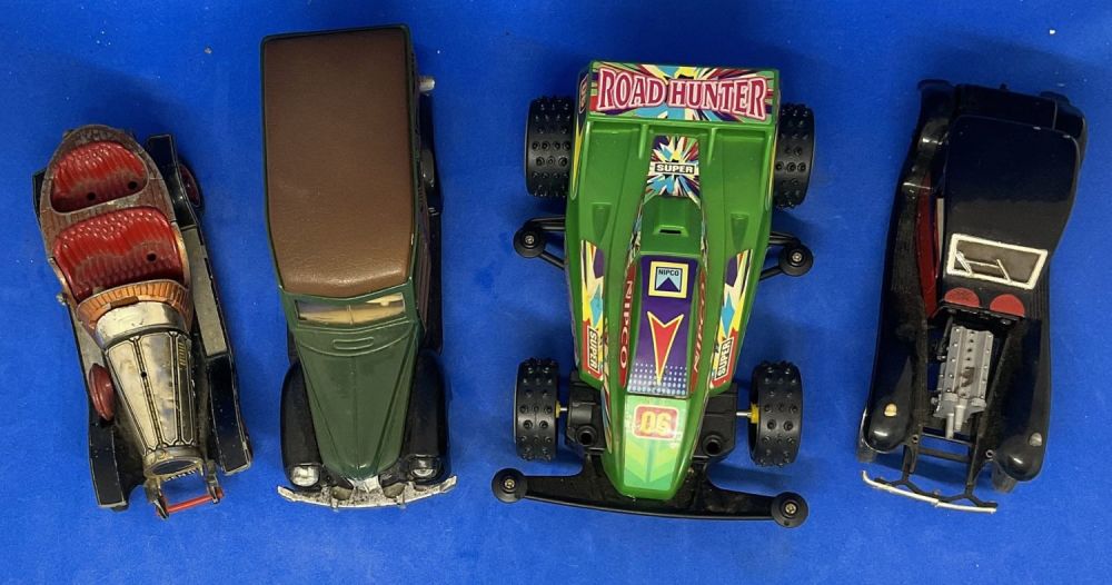 Lot 106: 4 x Various Model Cars unboxed includes Chitty...