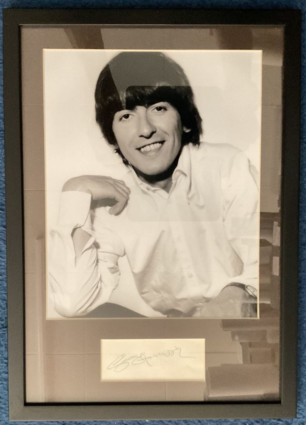 Lot 1: George Harrison signature piece in green ink mounted...