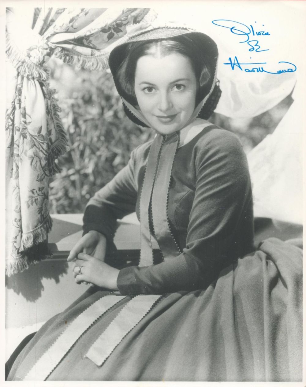Lot 5: Olivia de Havilland glossy vintage uninscribed 10x8 showing...