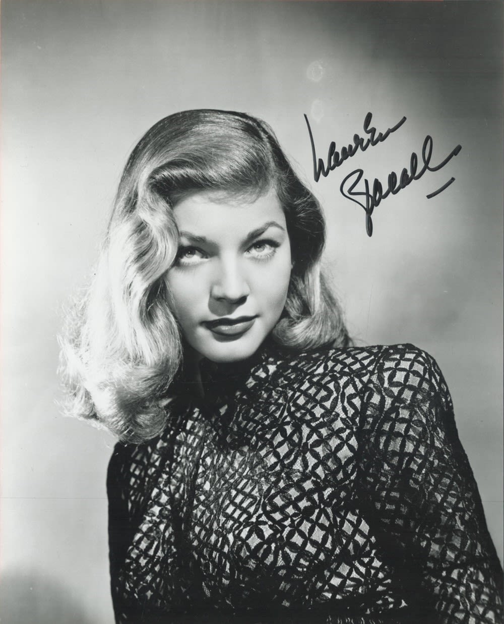 Lot 117: Lauren Bacall lovely early image b/w signed 10...