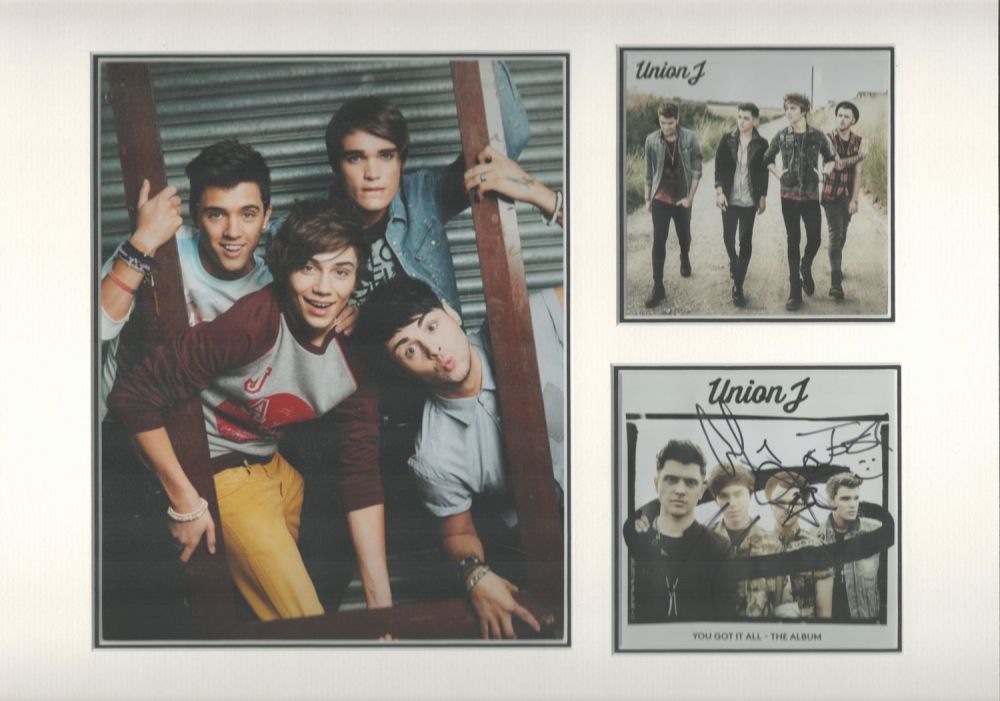 Lot 86: Union J autograph presentation. Mounted with one signed...