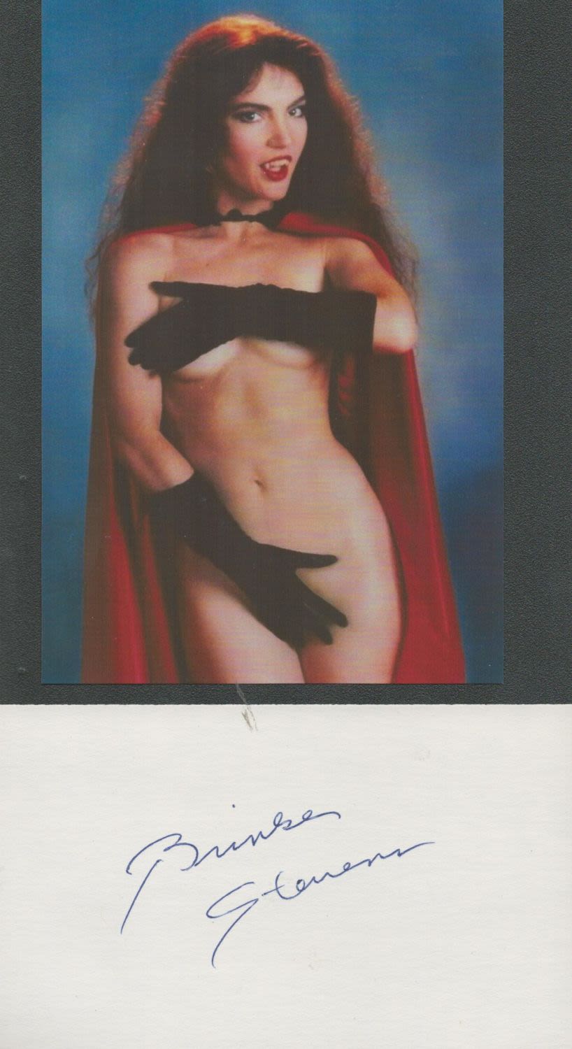 Lot 699: Brinke Stevens signature piece featuring a signed white...