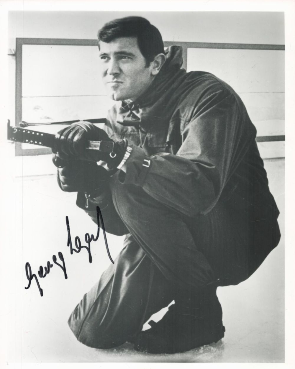 Lot 67: George Lazenby signed James Bond 10x8 black and...