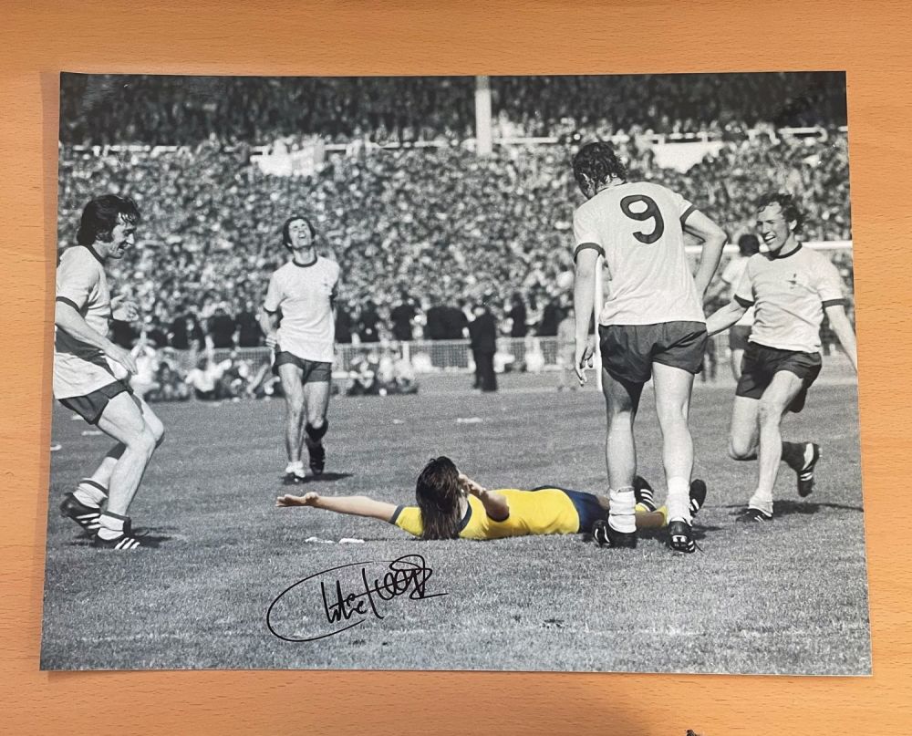 Lot 691: Football. Charlie George Signed 12x16 colourised photo. Photo...