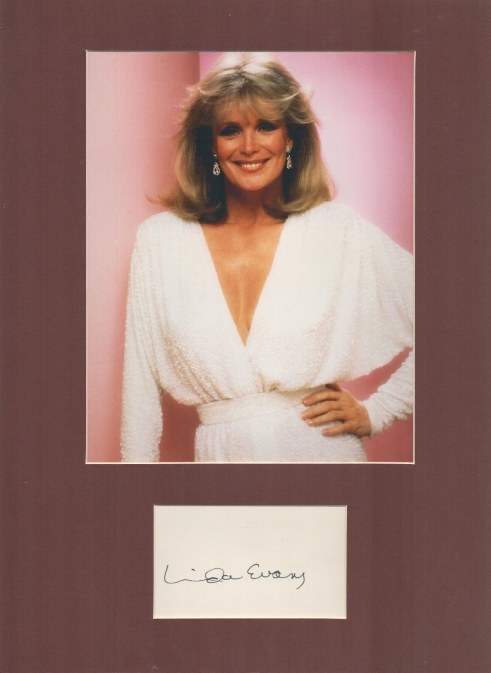 Lot 24: Actor, Linda Evans mounted signature piece, overall size...