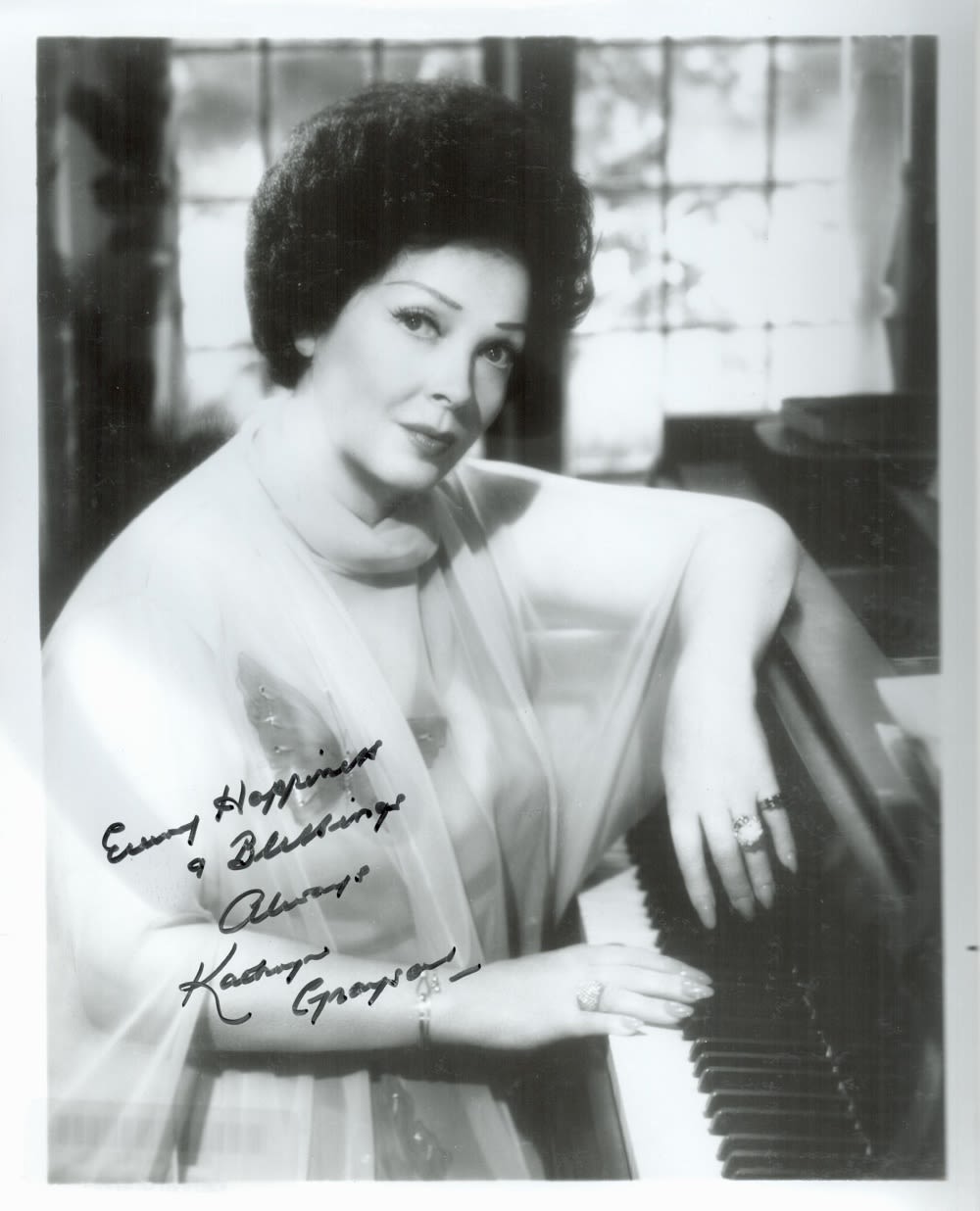 Lot 251: Kathryn Grayson signed 10x8 black and white photo....