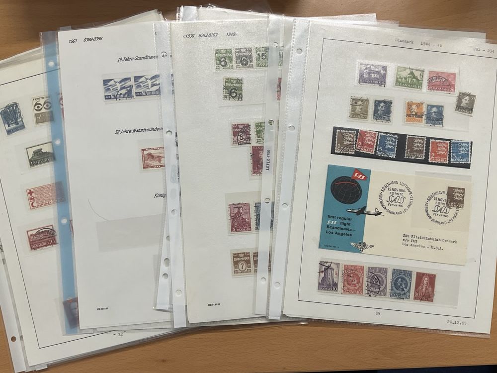 Lot 88: Denmark large collection of stamps on pages.
