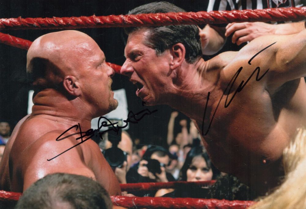 Lot 62: WWE Wrestlers Steve Austin and Vince McMan signed...