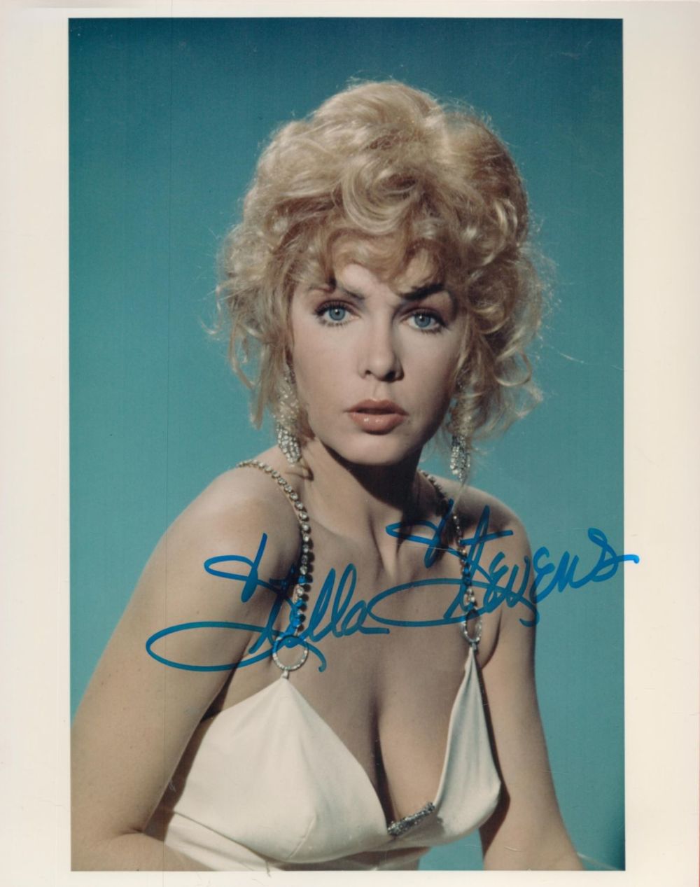 Lot 213: Stella Stevens signed 10x8 colour photo. Good condition....