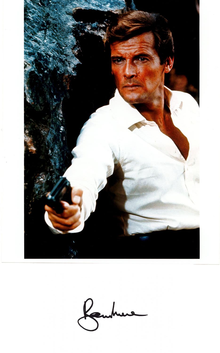 Lot 238: Roger Moore signed 6x4 white card complete with...