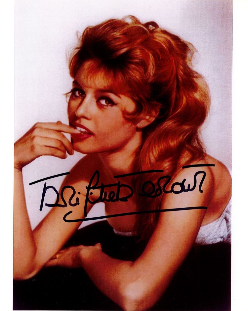 Lot 243: Brigitte Bardot signed 10x8 colour photo. Good condition....