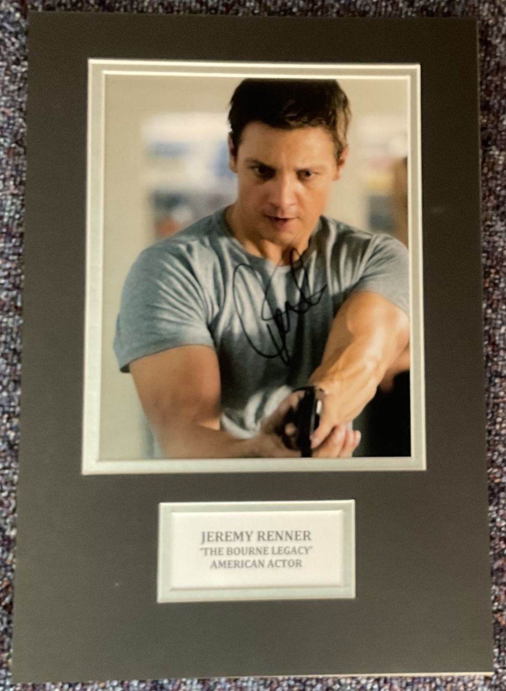 Lot 295: Jeremy Renner signed 16x11 overall mounted colour photo...