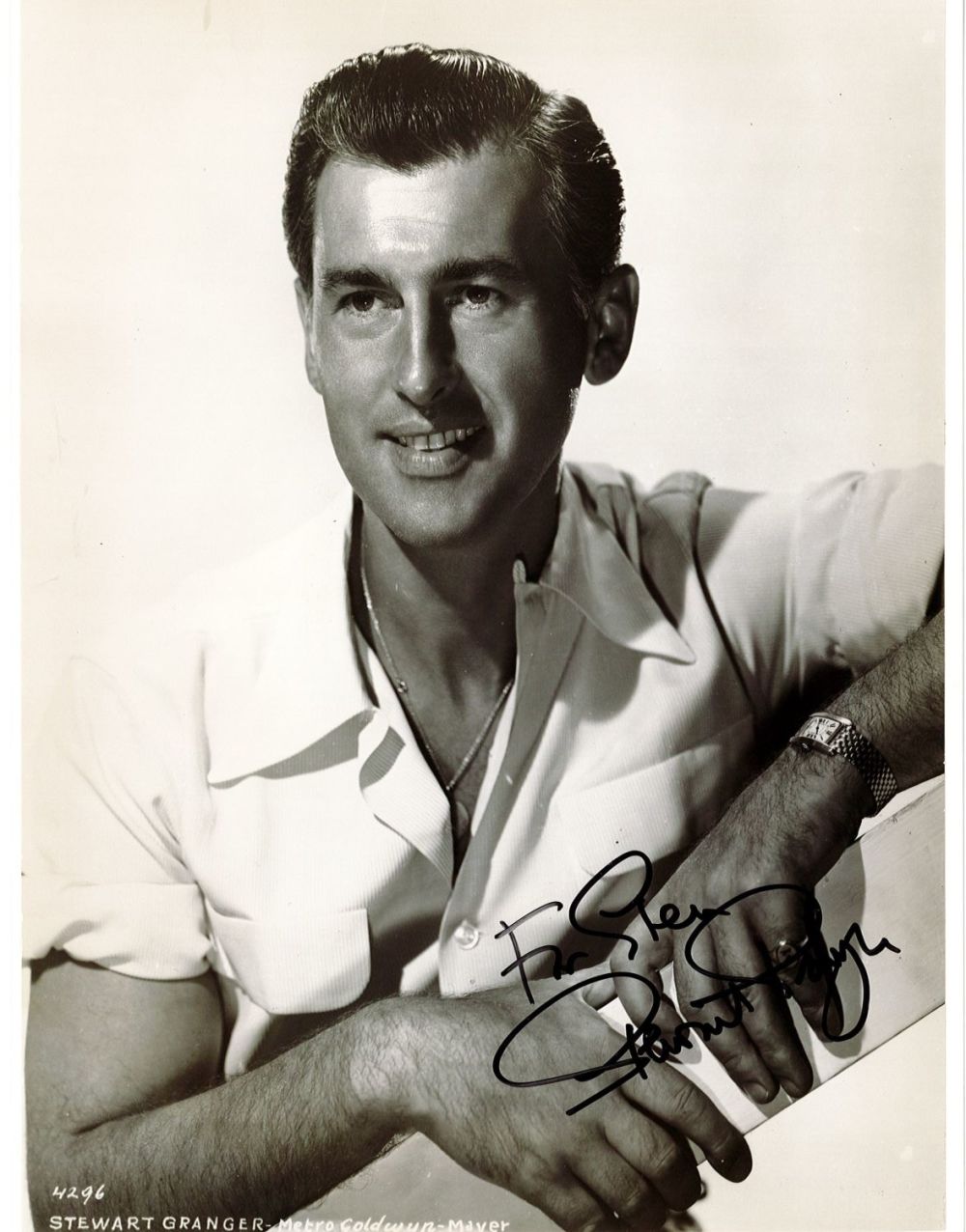 Lot 324: Stewart Granger signed 10x8 black and white vintage...