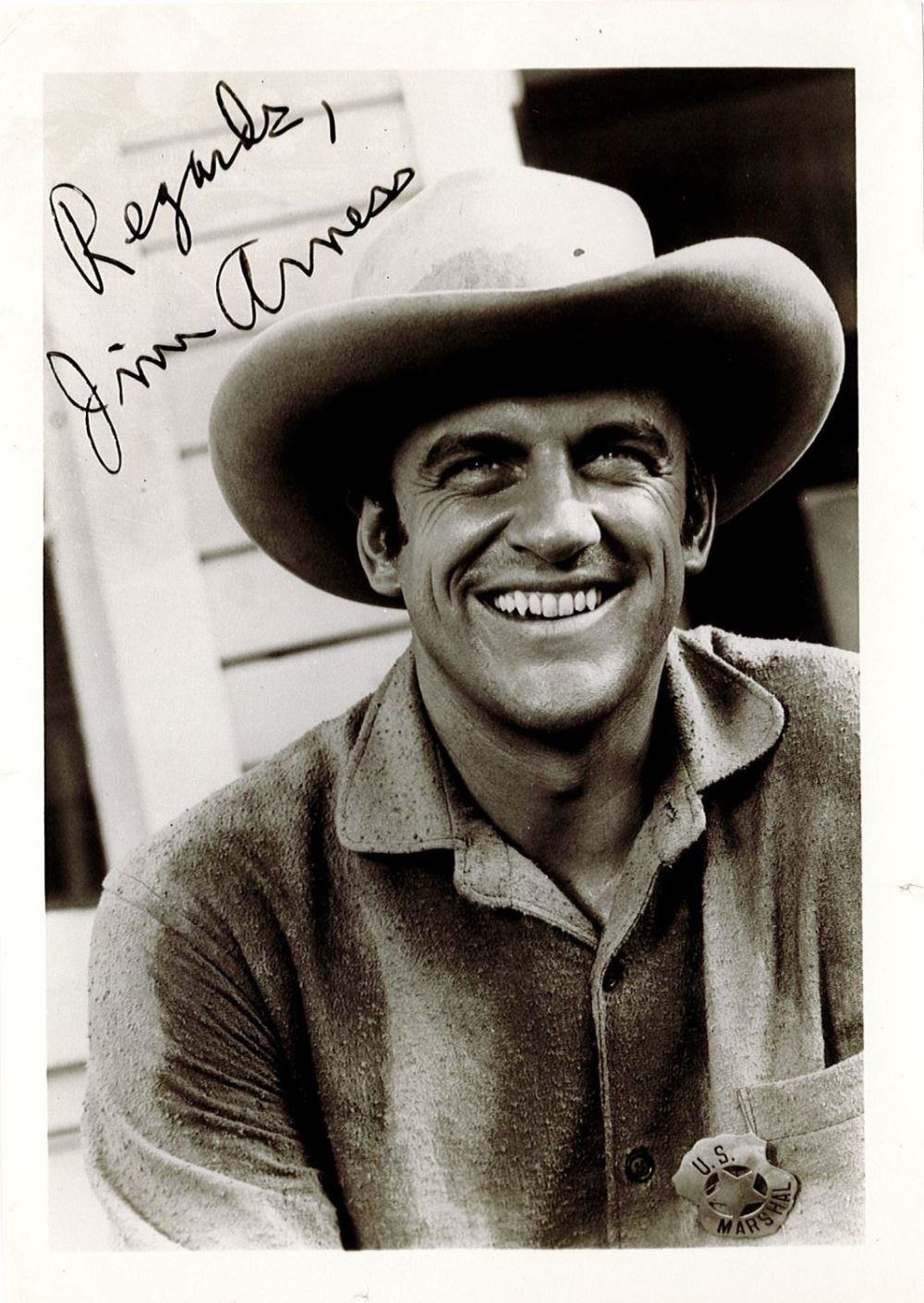 Lot 345: Jim Arness signed 7x5 black and white vintage...