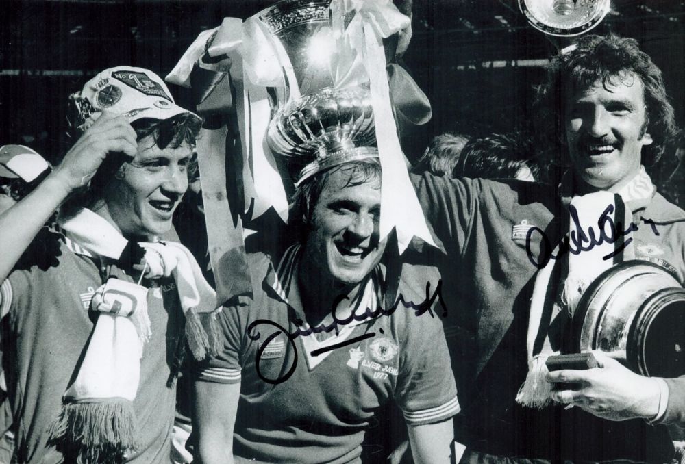 Lot 679: Jimmy Greenhoff and Alex Stepney Signed 12x8 inch...