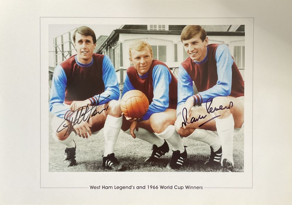 Lot 680: Geoff Hurst and Martin Peters Signed 20x14 inch...